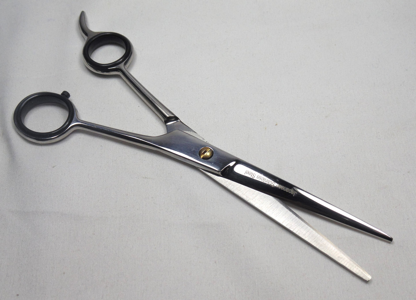 Left handed barber scissor 7"